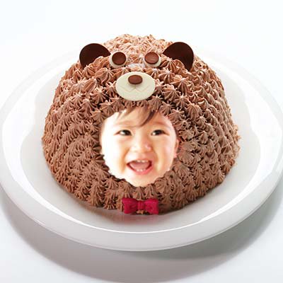 くまの動物ケーキを通販でお届けします 立体のくまケーキに人の顔写真を埋め込んだ着ぐるみのようなユニークなバースデーにおすすめの写真ケーキ