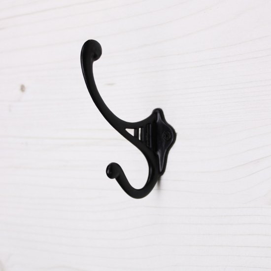 black hat and coat hooks