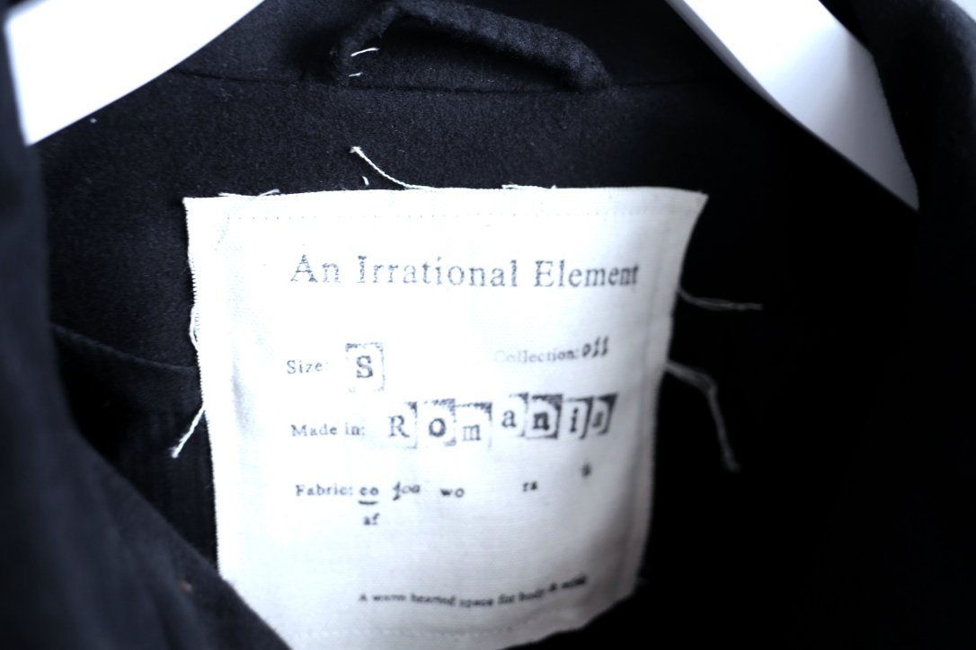 an irrational element(アン イレーショナル エレメント) CAMERA COAT