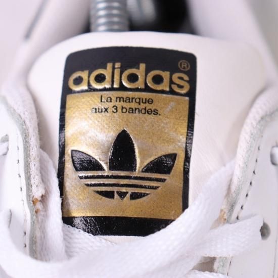 Adidas superstar shop gold logo