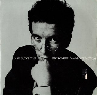 <img class='new_mark_img1' src='https://img.shop-pro.jp/img/new/icons15.gif' style='border:none;display:inline;margin:0px;padding:0px;width:auto;' />ELVIS COSTELLO & THE ATTRACTIONS - Man Out Of Time