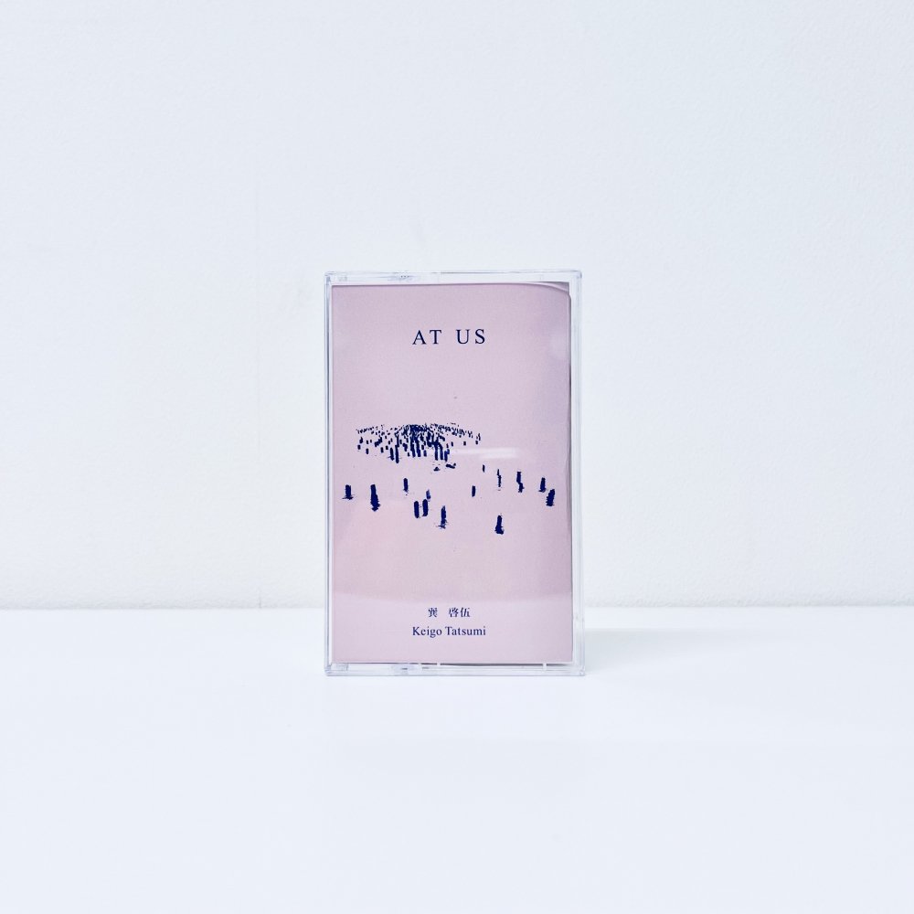 AT US [Cassette]