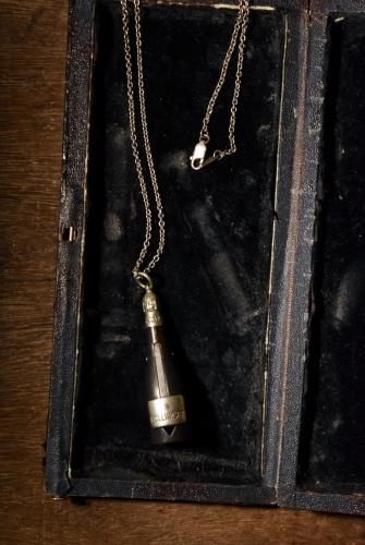 British mid 20th wood cigar cutter necklace