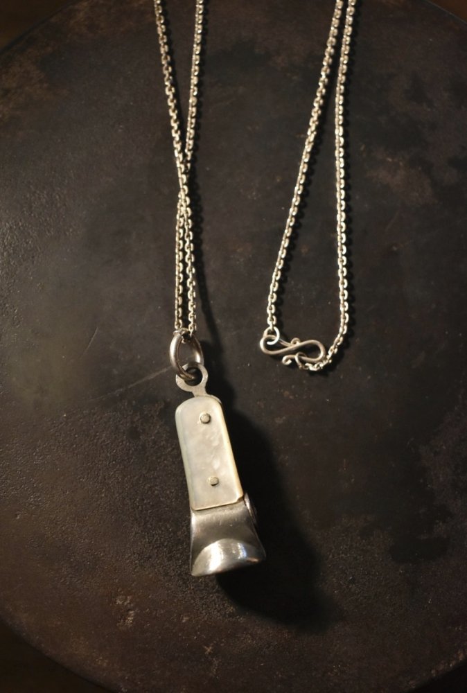 Vintage cigar cutter necklace
