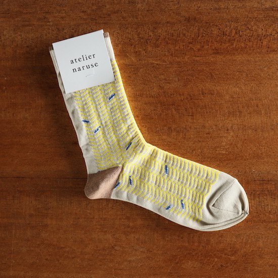 atelier naruse . cotton "herring-born" middle socks . yellow