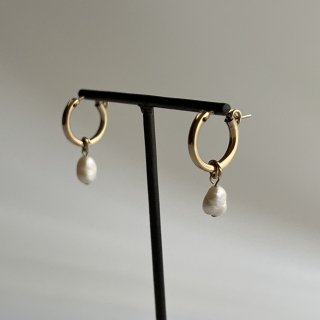 Fresh pearl hoop pierce