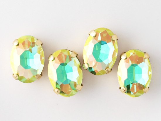 green oval glass gold setting 14x10mm