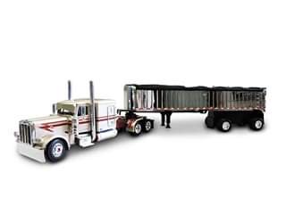 Peterbilt 389 with 63 Flattop Sleeper And Mac Frameless Spread-Axle Coal Dump Trailer